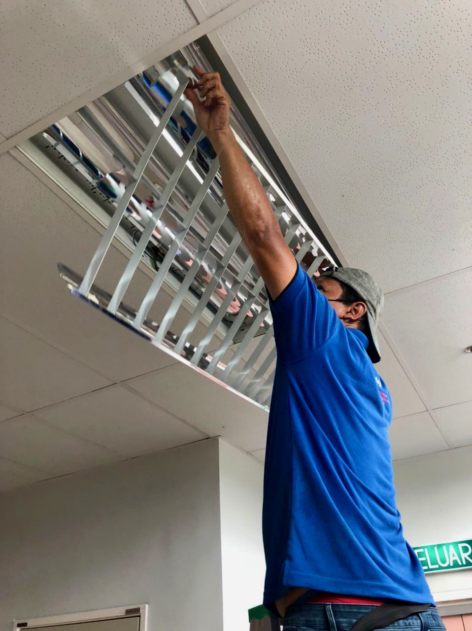 letrik union technician installing light casing